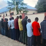 NSCDC Parades Suspended Niger Commandant, Officers Over Deaths Of 37 Miners
