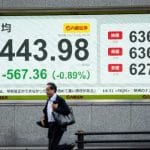 Stocks Edge Higher As Investors Await US Fed Rate Decision