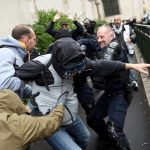 Clashes Erupt In Paris, Other French Cities As Police Arrest Nearly 1,000 Protesters